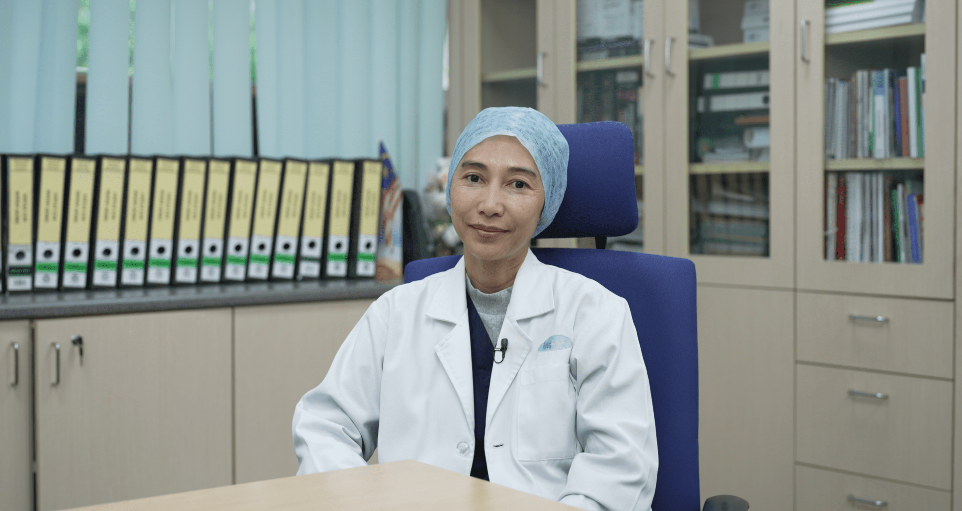 A lady doctor portrait which is Dr Farina, sharing her experience and insights on implementing the 0/1-hr rapid algorithm of Rapid Triage in emergency department of IJN Malaysia.