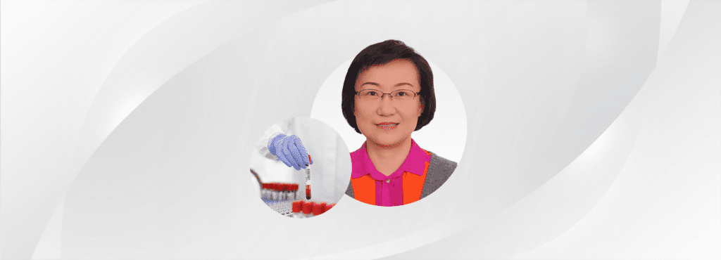 Headshot of Professor Guo Wei and image of a gloved hand holding a sample against a grey background.
