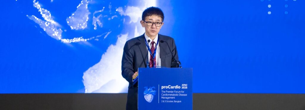 Speaker at a conference podium